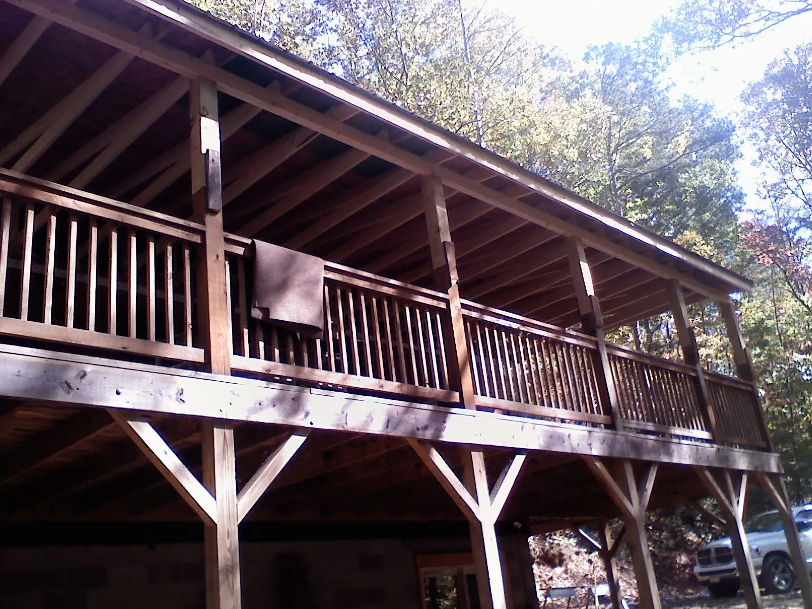 Timber framing under a new elevated porch and deck — Roof Leak Repair in West Hurley by Roofing Brothers